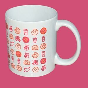 Patterned White Mug with Orange and Pink Accents
